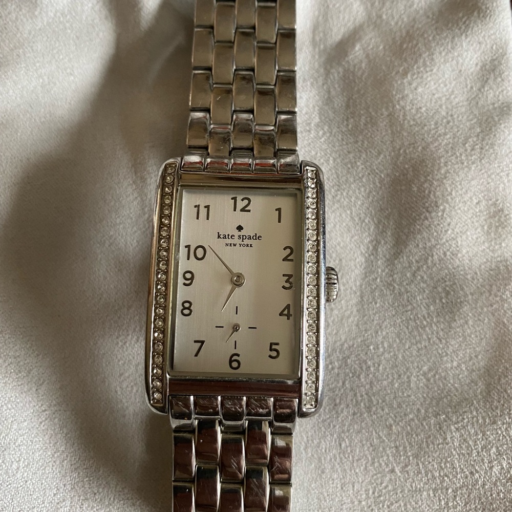 Kate Spade “In a New York minute” watch. Stainless steel.